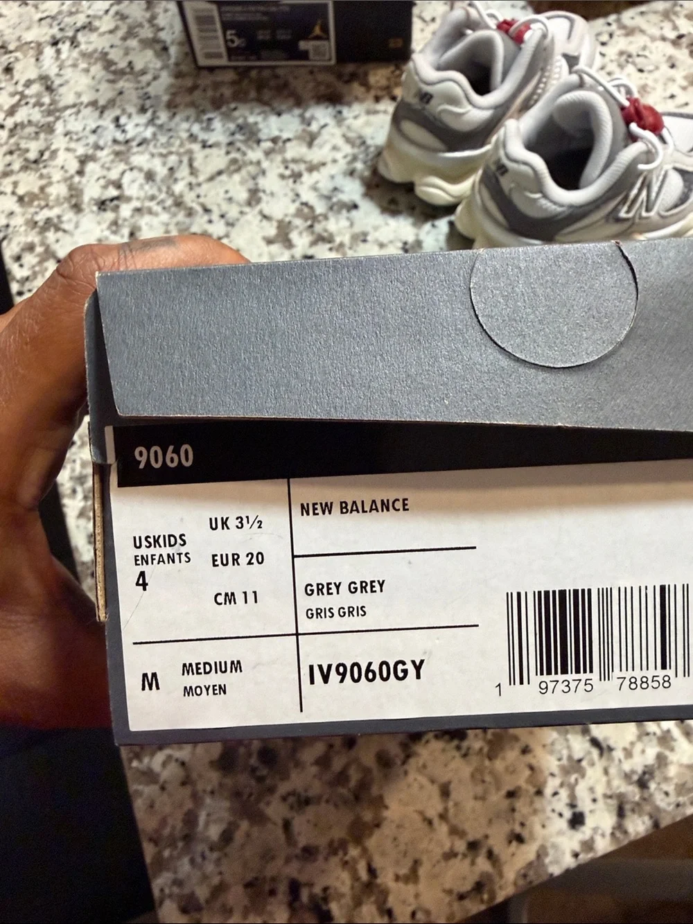 New Balance Kids Gray Sneakers with Red Toggle